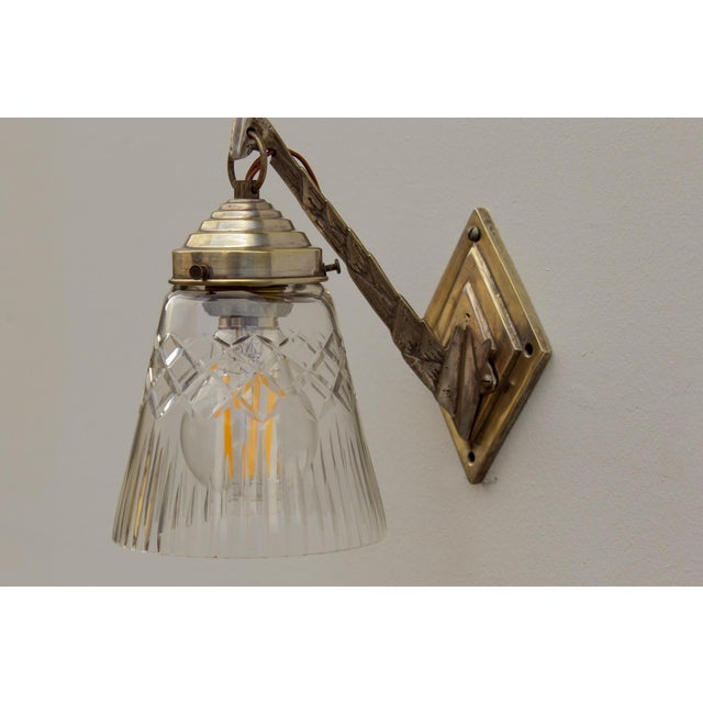 A beautiful original piece, made in the 1920s. cast brass, nickel-plated; cut lead crystal. glass undamaged. the lamp...