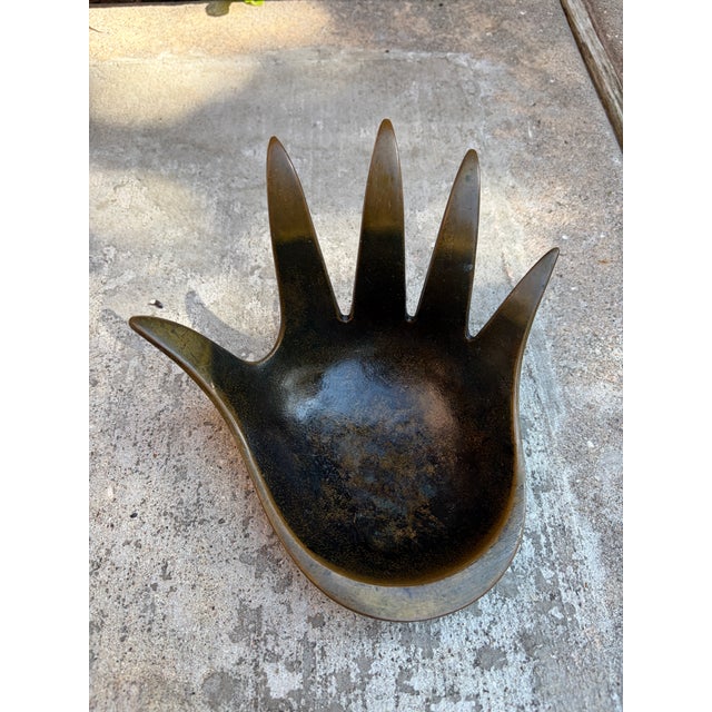 Mid-century modern sculptural bronze hand ashtray or vide poche by Walter Bosse for Herta Baller, Austria, circa 1950s....