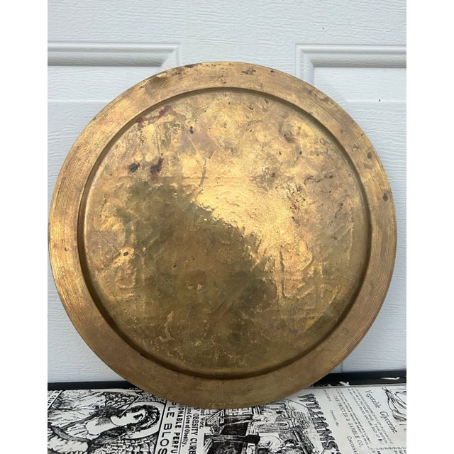 A beautiful and classic vintage round Moroccan etched brass wall plate. This is stunning piece with its rich metallic...