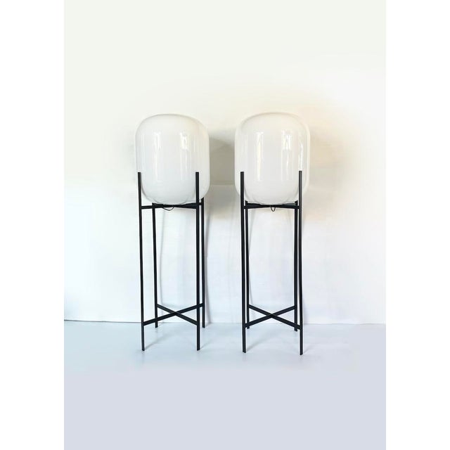 Particular contemporary floor lamp in Oda style for Pulpo by Studio Sebastian Herkner from 2014 characterized by a...