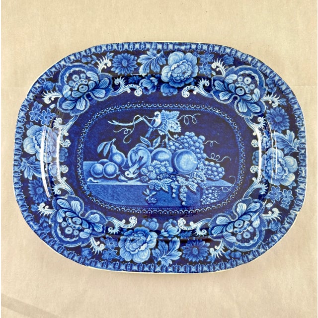 A dark blue on white earthenware transfer printed platter in the Birds and Fruit pattern, Joseph Stubbs and Kent...