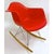 Vintage Mid-Century Modern style rocking chair with molded hard plastic arms and seat. Metal Eiffel Tower style leg...