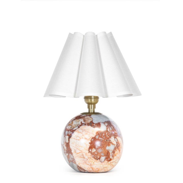 Richly veined natural marble forms the foundation of the Giorgio Mini Table Lamp, bringing depth and character to its...