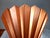A pair of Copper Fluted sconces by Larry Lubov have an architectural feel in warm copper and the scope and size that turns...