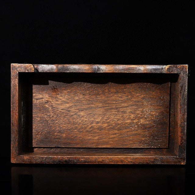 An exquisite vintage Chinese hardwood (Huali wood) jewelry box with a classic domed lid. This beautiful piece features a...