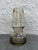 Hand blown tapered top with pinched middle amber colored glass vase. There are no markers marks on the vase that I could...