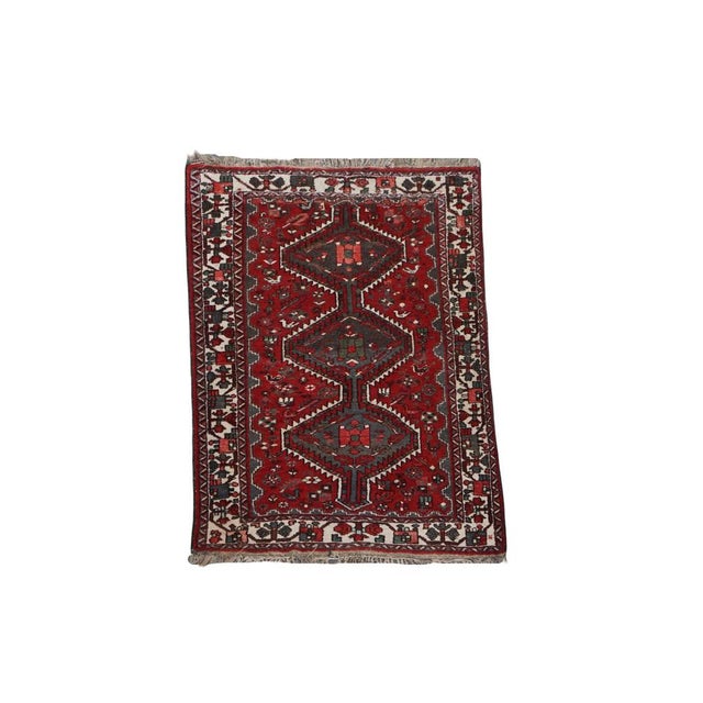 This subtle vintage oriental rug including red and gray colors 186x119cm. Let your home shine with this beautiful rug. It...