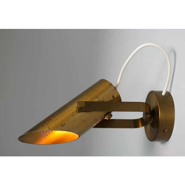 Introducing a striking pair of mid-century Italian wall sconces from the 1960s, meticulously crafted from high-quality...