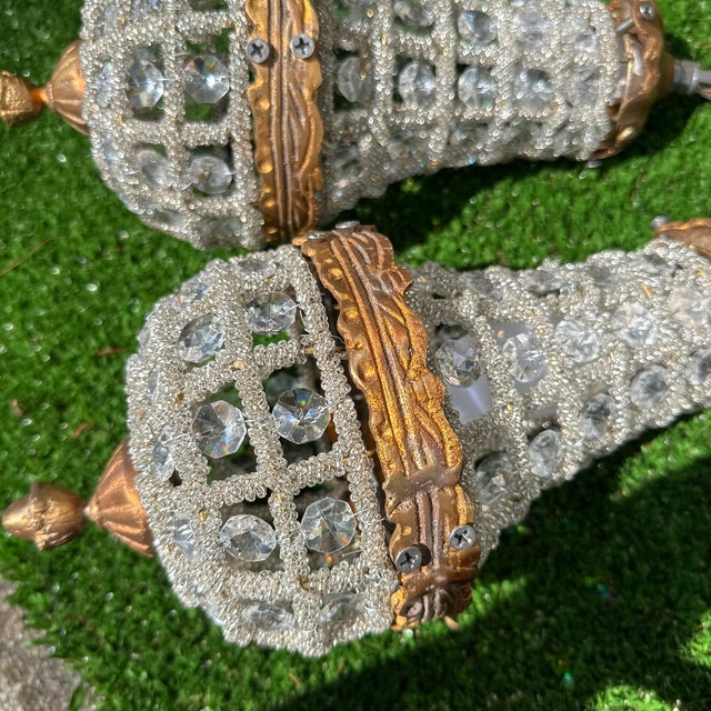 Up for consideration is a beautiful vintage pair of regency style gold and crystal baby pendant lights. These would look...