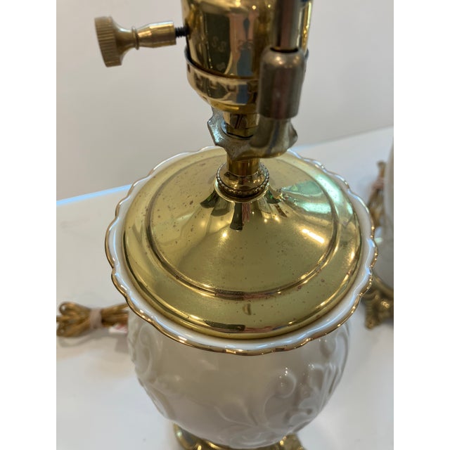This pair of fine porcelain lamps is signed Lenox The harp, cap, socket &base are solid brass Height to top of harp 22...