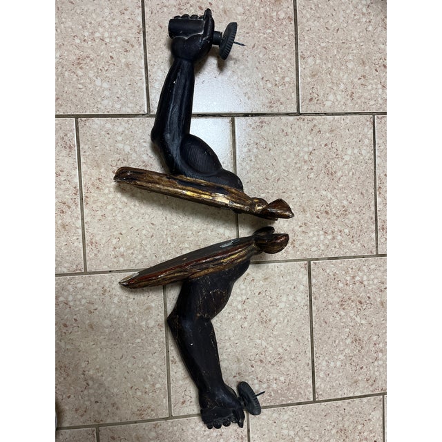 Dramatic Antique Set of Candle holders, outstretched powerful fists. Hand carved and painted with gold and black tones....