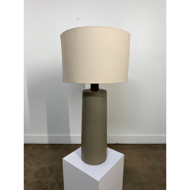 An exceptional monumental ceramic table lamp by Gordon and Jane Martz for Marshall Studios, showcasing the sculptural...
