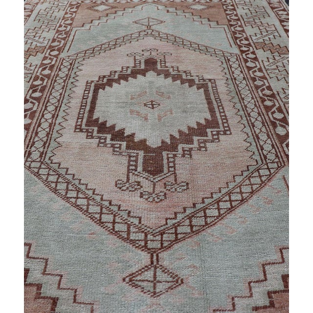 Measures:3'6 x 5'7. Muted color antique Turkish Oushak carpet with traditional floral medallion design. Keivan Woven Arts...