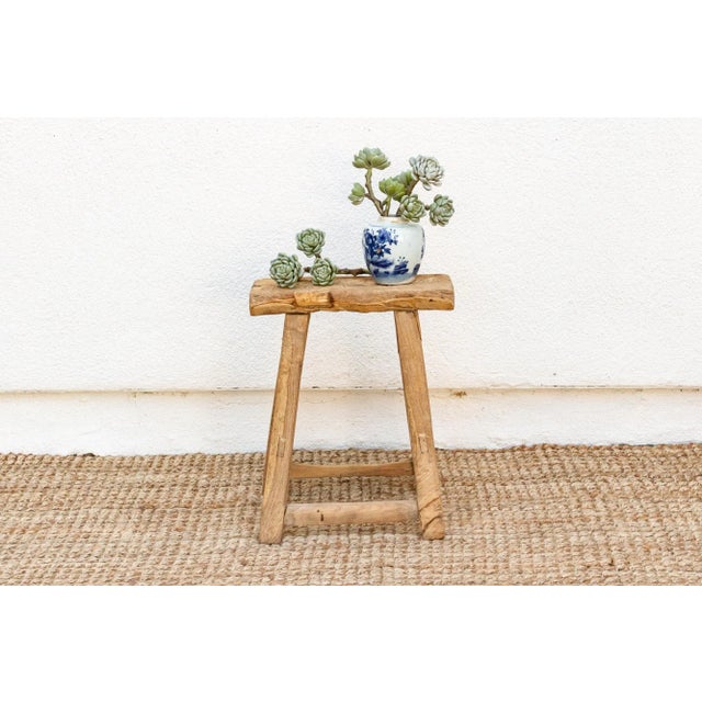 Add a touch of rustic charm with this Versatile antique Asian stool. Perfect as extra seating or a small end table, this...