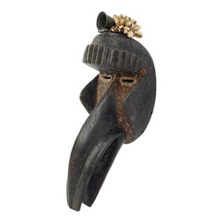 Early 20th Century Dan Guerre Guere Bird Mask with Shells and Brass Bell Cote d'Ivoire For Sale