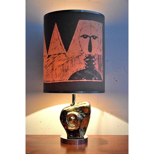 This is an exclusive late 1960s gold plated ceramic table lamp designed by the sculptor Paolo Granchi from Pisa, Italy....