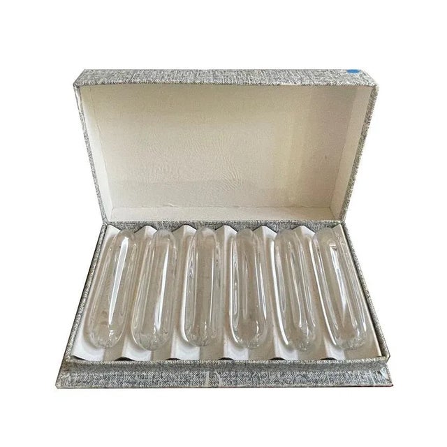 Art Deco knife rest by “Daum”, Nancy around 1960. Crystal glass. 6 oblong rectangular knife rests with indented sides....
