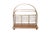 An Edwardian period English magazine rack. A beveled oak base with the brass and wire mesh dividers is raised on turned...