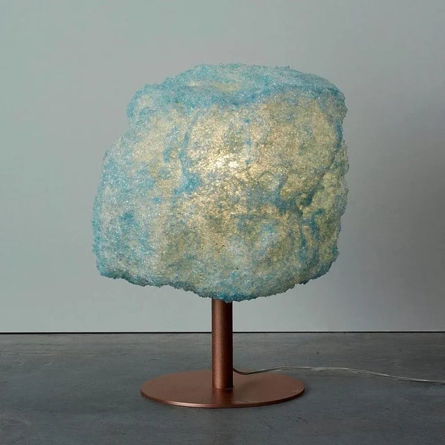Blue storm table light copper by johannes hemann material: polycarbonate, walnut dimensions: ø 38 x h 45 cm the storm...