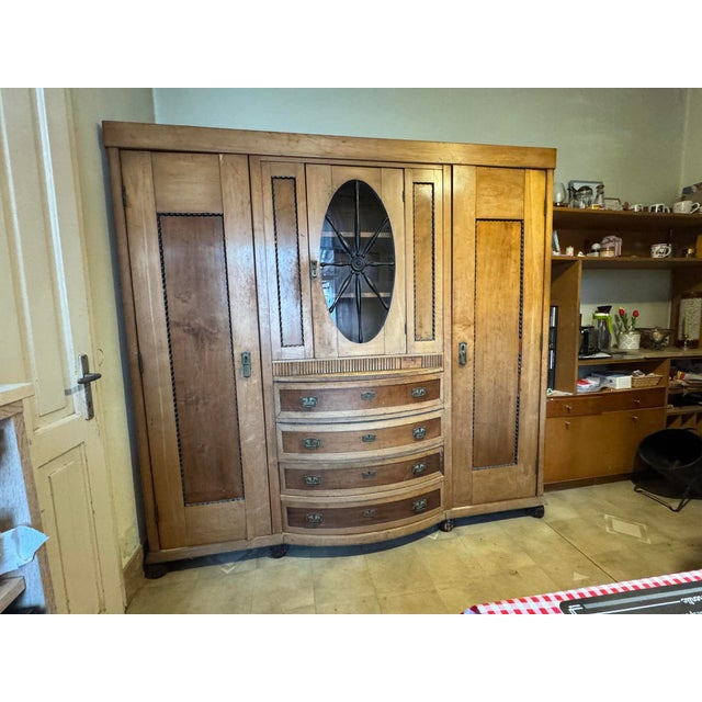 This beautiful vintage Art Deco wooden cabinet is an elegant and timeless piece, adding style and functionality to any...