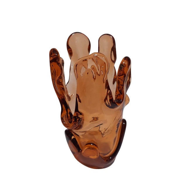 A large chunky vase. Signed Fire and Light on the bottom. An amber orange shade. This splash style vase has 5 uneven...