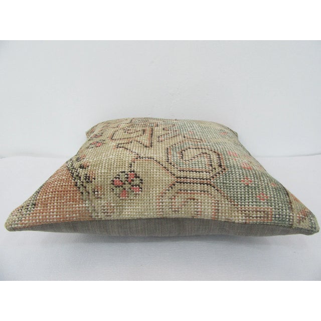 This is a pillow cover made from a vintage kilim rug. The piece was properly washed and ready to use. Pillow inserts not...