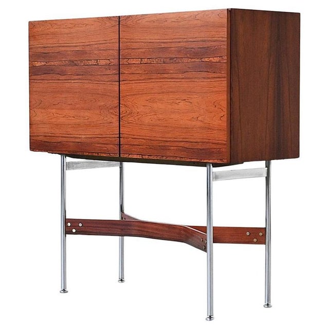 Striking and sculptural, this bar cabinet was designed by Rudolf Bernd Glatzel for Fristho Franeker in the Netherlands in...