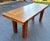 Beautiful unique, custom-made solid walnut dining / Parsons table with striking ebony inlay details. The thick top is made...