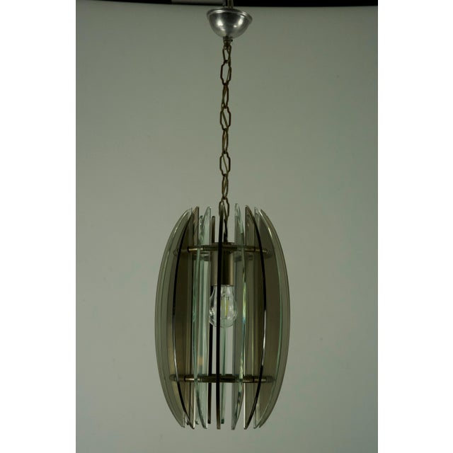 Very good vintage condition with normal trace of age and use for this pendant made from fume and clear thick glass and...