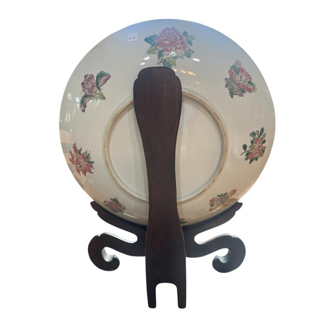Impressive large-scale Chinese porcelain charger featuring a richly detailed imperial portrait surrounded by an elaborate...