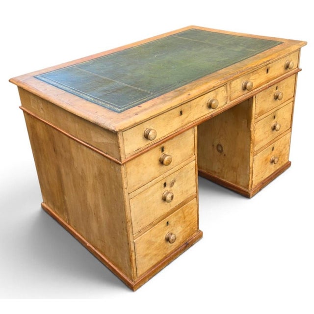 A handsome and unusually well-proportioned English Mid-Victorian country house pedestal desk, dating to circa 1840–1860,...