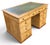 A handsome and unusually well-proportioned English Mid-Victorian country house pedestal desk, dating to circa 1840–1860,...