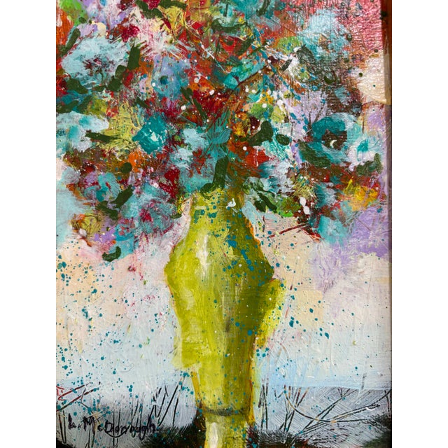 “Burst of Spring.” This small yet striking painting radiates energy and spontaneity. A luminous green vase anchors the...