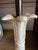 Bring a touch of coastal elegance and retro flair to your space with this stunning 1980s Hollywood Regency ceramic palm...