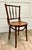 This antique bentwood chair dates to the early 20th century and is attributed to Mundus, one of the prominent Austro-...