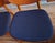 Finely constructed pair of Danish dining chairs in teak and beech, seats recently re-covered with a structured navy blue...