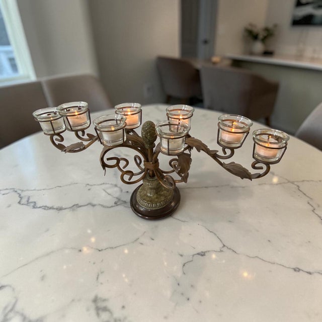 Eight arm low profile candelabra centerpiece for family or company dinners. Each arm has a glass votive for a tealight or...