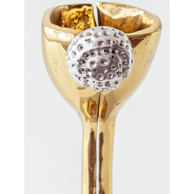 Striking Brutalist golf trophy sculpture by David Marshall, in 1970s crafted in cast brass and aluminum. The goblet-style...