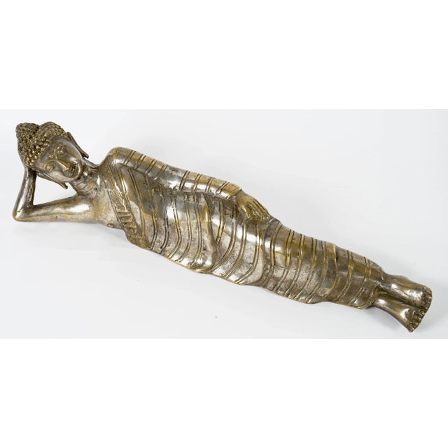 Mahaparinirvana Buddha sculpture, traditionally depicting the Buddha lying on his right side in his final moments. It is...