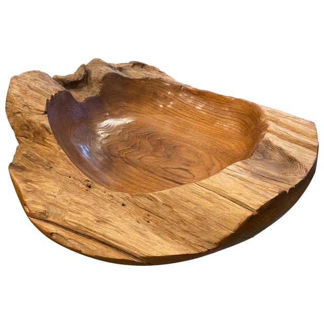 This organic teak vessel serves as a stunning sculptural piece and a practical solution to hold fruit, magazines, towels,...