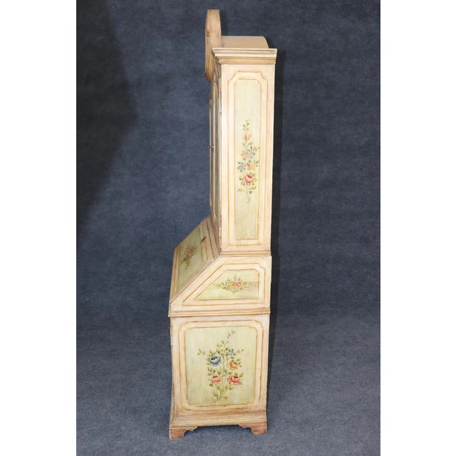 "A stunning example of mid-20th-century Italian craftsmanship, this Venetian-style secretary desk features a classic...