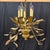Antique French chandelier is made of gold leafed “tole” interlaced curved leaf forms on branches. The elegant shape...