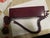 Here is a very mid century telephone that has a streamlined inconspicuous rectangular shape and burgundy color. It would...