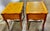 This a pair of vintage mid-century side tables featuring a characteristic French Provincial design, defined by scalloped...