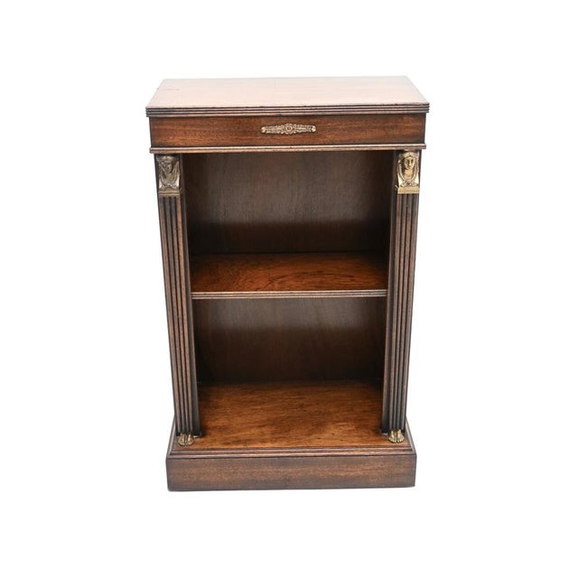 A lovely antique Neoclassical Empire style open bookcase, dating from around the 1930-50’s period. The quality is...