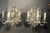 pair of 1900's Caldwell silver plated sconces with cherubs on the backplate and 3 lights