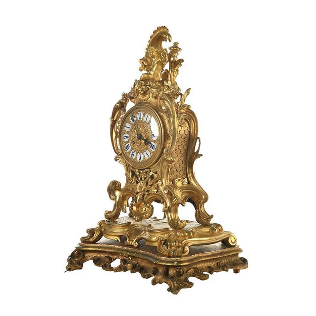 Louis XV Style Clock, in Good conditions. Designed before 1890 This piece is designed in the style of the selected...