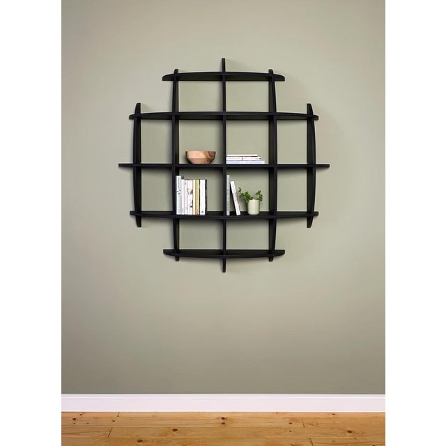The little round thing! Big Jim 125 fits almost any free wall space and doesn't require much room height. Very decorative,...