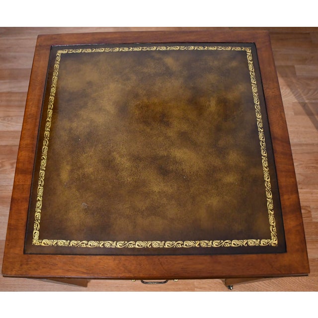 We are pleased to offer this beautiful Pair of English Regency side tables, from the 1930s. This pair is made of Mahogany...
