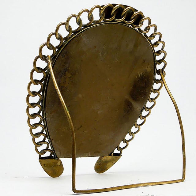 Mirror made in Belgium in the 30s. It was made of brass. It is preserved in good condition, bears traces of use. The...